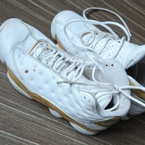 White and Michael Jordan Nike Gold Athletic Sneakers